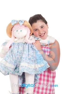 Little Girl With Doll Stock Photo