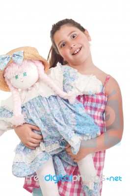 Little Girl With Doll Stock Photo