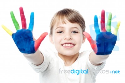 Little Girl With Painted Hands Stock Photo