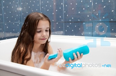 Little Smiling Girl Taking A Bath Stock Photo