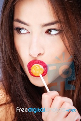 Lollipop In Her Mouth Stock Photo