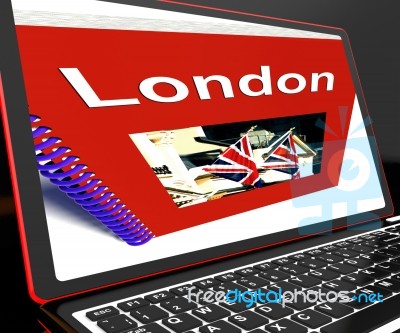 London Book On Laptop Shows Britain Guide Stock Image