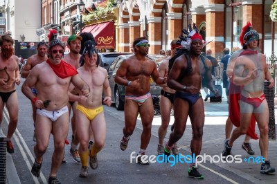 London - July 27 : Friends Jogging Through The Streets Of London… Stock Photo