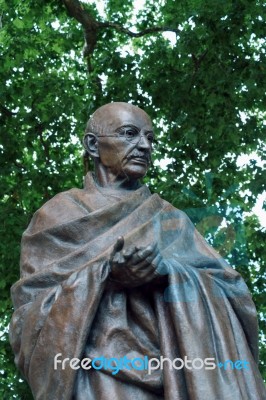 London - July 30 : Statue Of Mahatma Ghandi In Parliament Square… Stock Photo