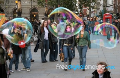 London - November 12 : Faces Through The  Bubbles In London On N… Stock Photo