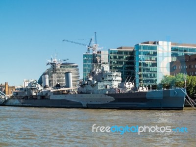 London, Uk - June 14 : Hms Belfast Anchored Near Tower Bridge In… Stock Photo