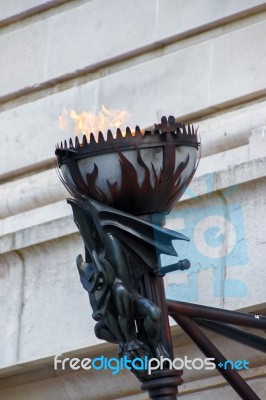 London/uk - March 21 : Replica Of An Old Torch With Living Flame… Stock Photo