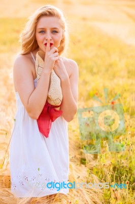 Lonely Beautiful Young Blonde Girl In White Dress With Straw Hat… Stock Photo