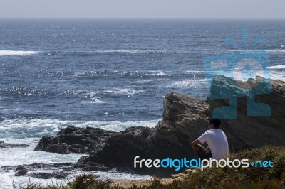 Lonely Man Gazing The Sea Stock Photo