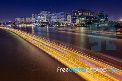 Long Exposure Photography Of Siriraj Hostipal And Lighting Of Boat Traffic In Chaopraya River Important Landmark Of Bangkok Thailand Capital Stock Photo