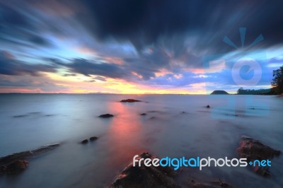 Long Exposure Seascape With Fantastic Rock Surface Stock Photo