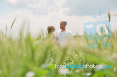 Long Shot Of A Newly Married Couple Stock Photo