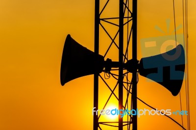 Loudspeaker On Pillar And Sunset In The Evening Stock Photo