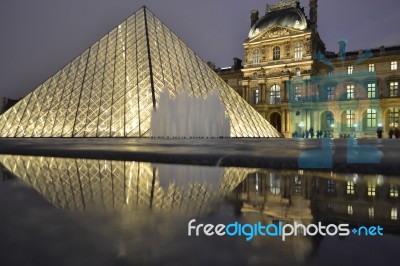 Louvre Reflection Stock Photo