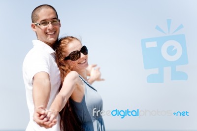 Love Couple Stretching Their Hands Together Stock Photo