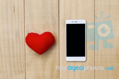 Love Phone, Red Heart And Smartphone Stock Photo