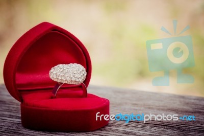 Love Ring In Red Velvet Stock Photo