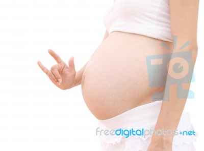 Love Sign Hand Abdomen Of Pregnant Woman On White Background Stock Photo