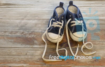 Love Written With The Laces Of Some Adorable Shoes Stock Photo