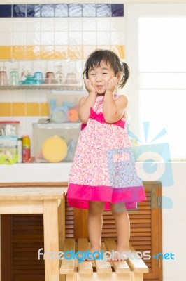 Lovely Acting Of Little Children Dinning Table In Home Kitchen R… Stock Photo