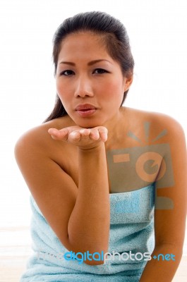 Lovely Female Model Posing With Flying Kiss Stock Photo