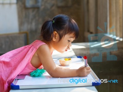 Lovely Kid Practice For Writing On White Broad Before Class Lear… Stock Photo