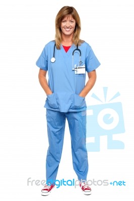 Lovely Medical Expert With Hands In Pocket Stock Photo