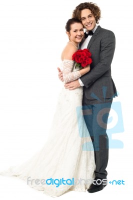 Lovely Young Married Couple Embracing Warmly Stock Photo