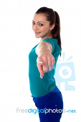 Lovely Young Pointing Towards You Stock Photo