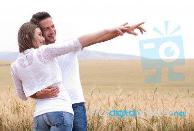 Loving Couple In Field Stock Photo