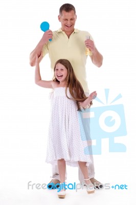 Loving Father Playing With His Beautiful Daughter Stock Photo