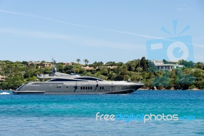 Luxury Yacht Leaving Porto Cervo In Sardinia Stock Photo