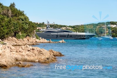 Luxury Yacht Leaving Porto Cervo In Sardinia Stock Photo