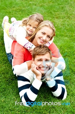 Lying Family In Outdoor Stock Photo