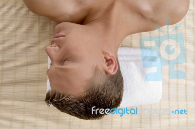 Lying Man Under Spa Treatment Stock Photo