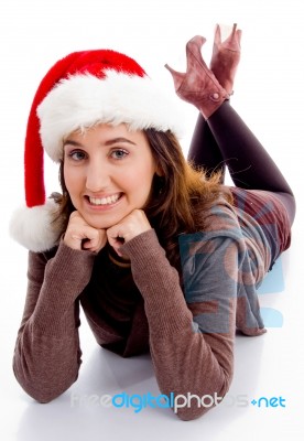 Lying Woman Wearing Santa Hat Stock Photo