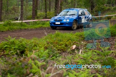 M. Brady Driving Rover Mg Stock Photo