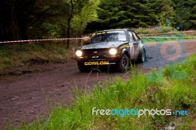 M. Conlon Driving Ford Escort Stock Photo