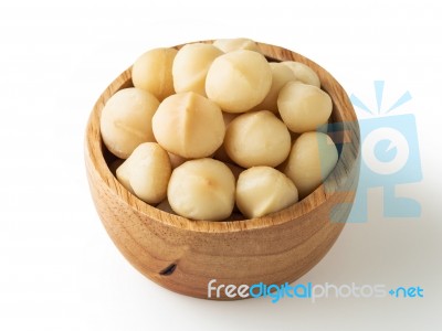 Macadamia Nuts In Wooden Bowl Stock Photo