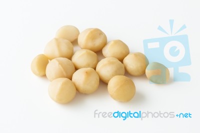 Macadamia Nuts On White Stock Photo