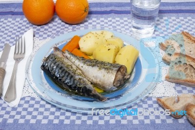 Mackerel Fish With Potato And Carrot Stock Photo