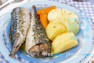 Mackerel Fish With Potato And Carrot Stock Photo