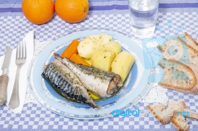 Mackerel Fish With Potato And Carrot Stock Photo