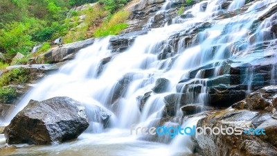 Mae Ya Waterfall With Moss And Rocks Located In Chiang Mai Stock Photo