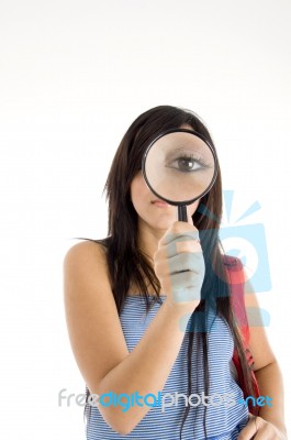 Magnifying Eye Of Girl Stock Photo