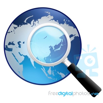 Magnifying Glass With Earth Globe Stock Image