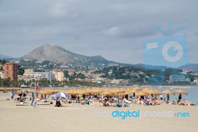 Malaga, Andalucia/spain - July 5 : People Relaxing On The Beach Stock Photo