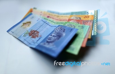 Malaysian Ringgit Currency On White Background Stock Photo