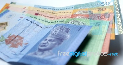 Malaysian Ringgit Currency On White Background Stock Photo