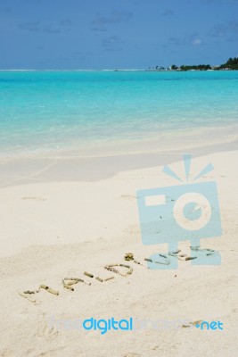 Maldives Written In A Sandy Tropical Beach Stock Photo